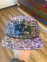 Black Oak leather patch hat with Deer Mount on grey camo Blank Rope Hat