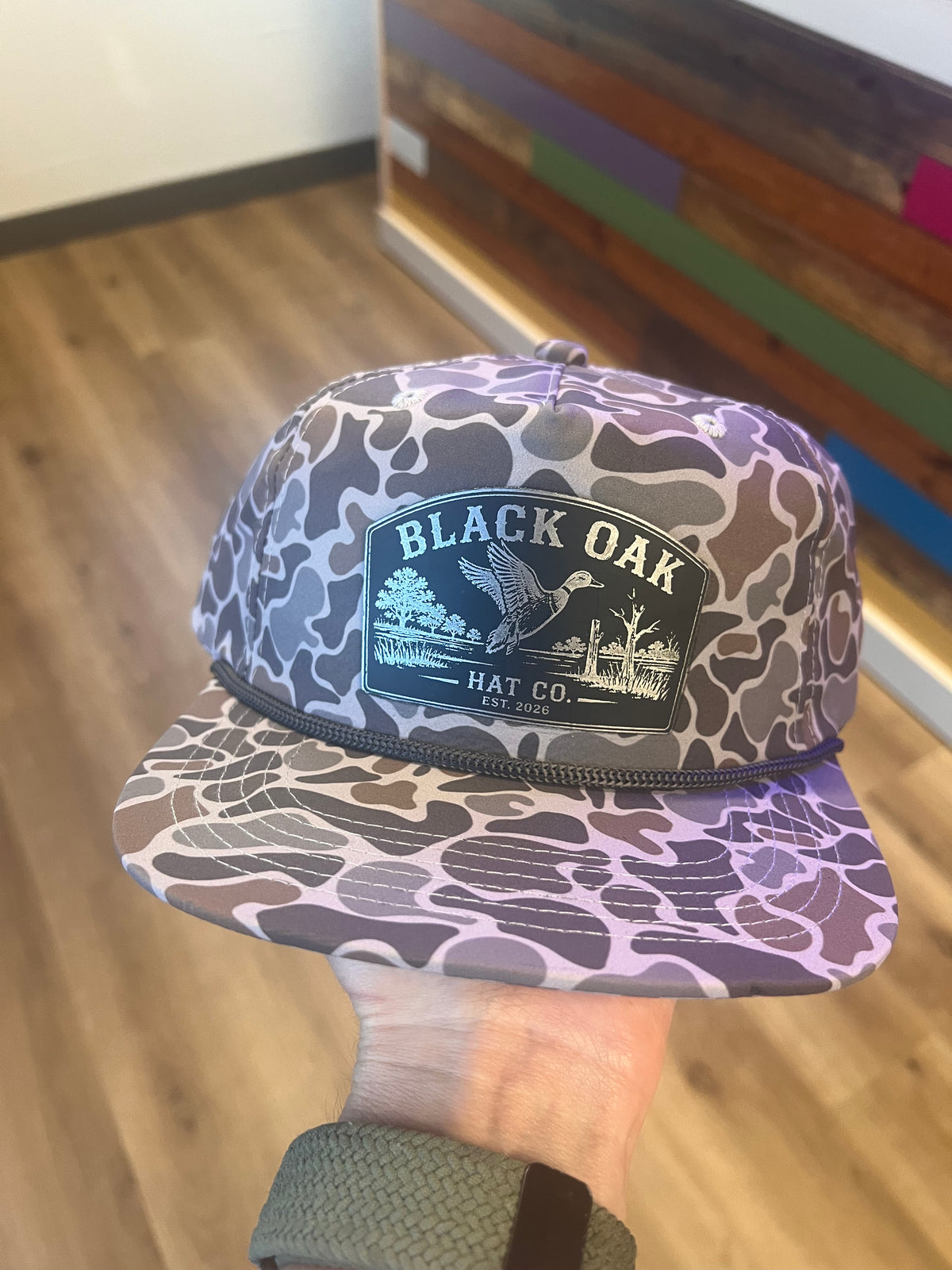 Black Oak leather patch hat with duck on the water on grey camo Blank Rope Hat