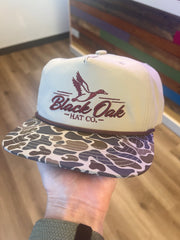 Black Oak 3D Puff maroon on Camo/Tan Blank Rope Hat